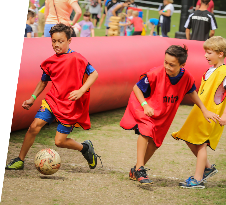 children playing football